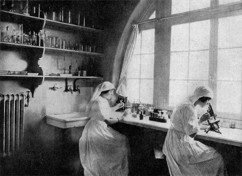Two women conducting scientific research in a lab