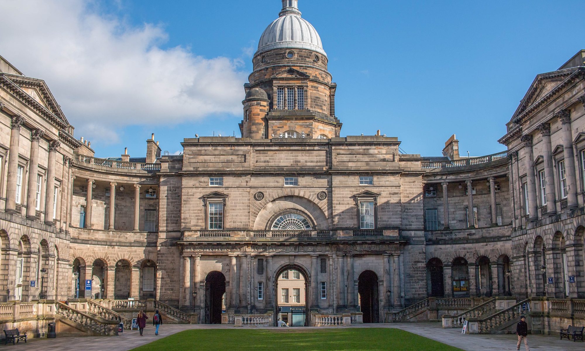 Edinburgh University Old College, neo-classical building with green lawn