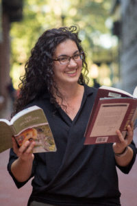 Nora J. Williams with Books