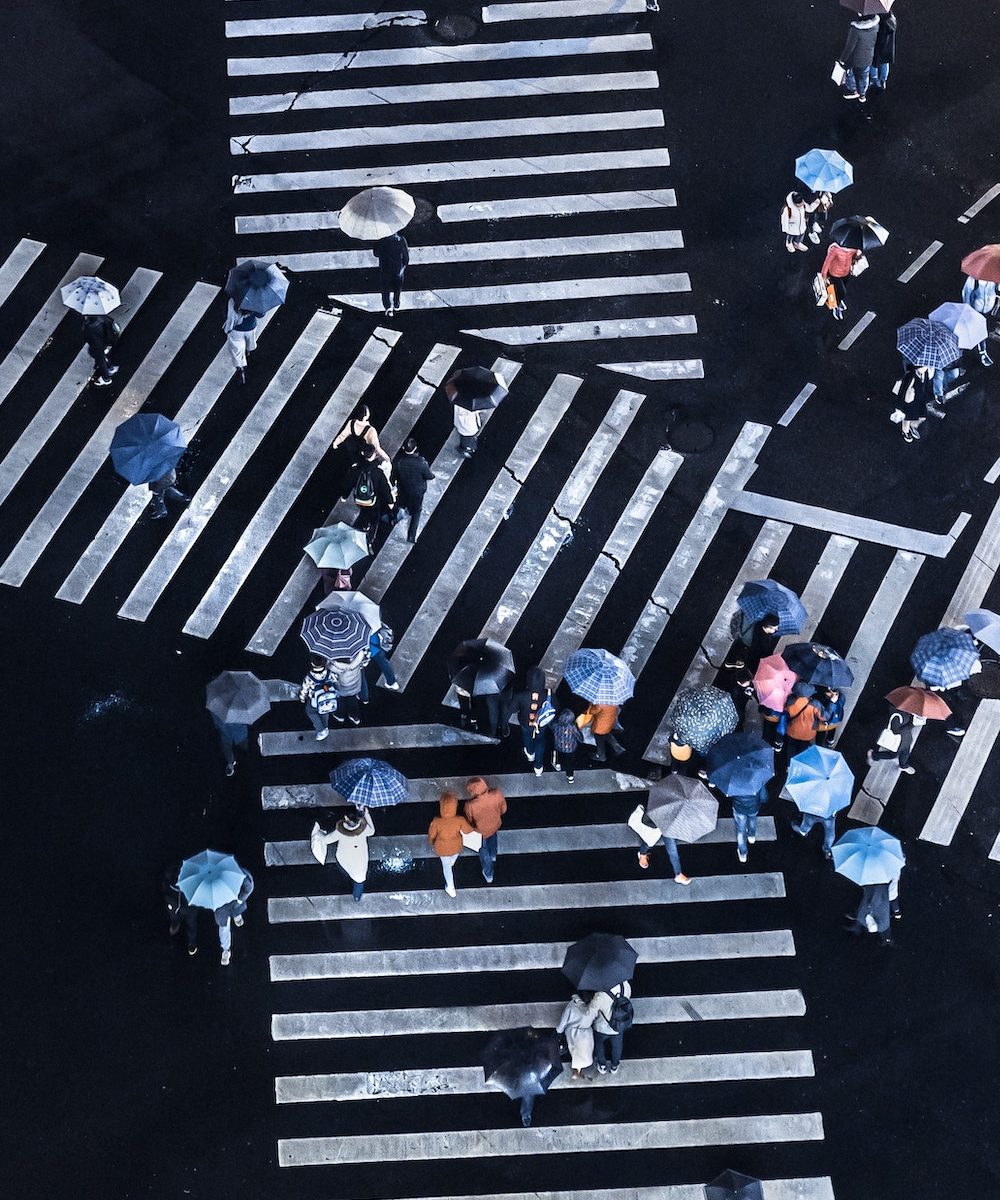 intersecting pedestrian crossings with people walking