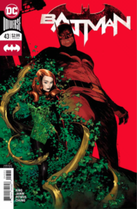 Ivy is shown wrapped with ivy and other green leaves.