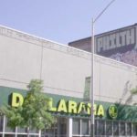 Philth -graffito above Dollarama