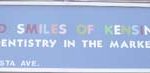 Sign: United Smiles of Kensington - Dentistry in the Market