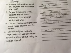 A photo of a worksheet with questions about the excavation activity