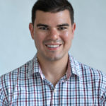 A headshot of Andrew Rimby.