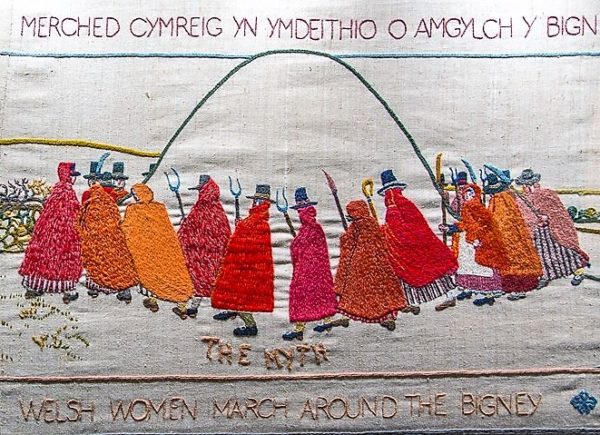 Detail from the Last Invasion Tapestry showing Welsh women in their red cloaks.