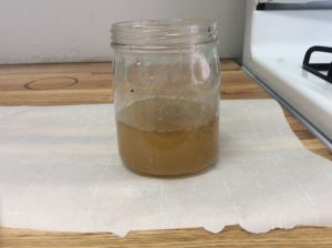jar of liquid beef fat