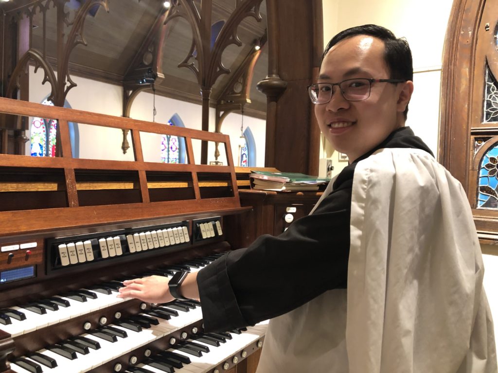 Justin at the organ at St. James