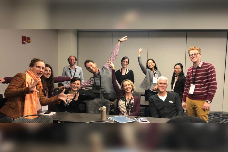 DMIG members at a business meeting.